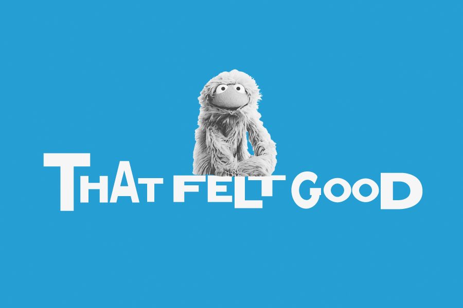 Blue background with text that says "That felt good" with a white puppet