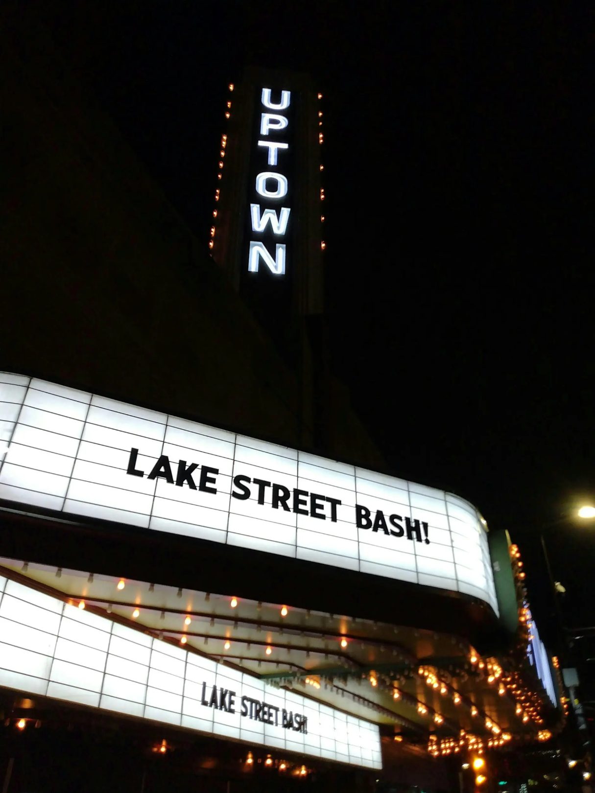 Uptown Sign with "LAKE STREET BASH" displayed on outdoor theatre sign